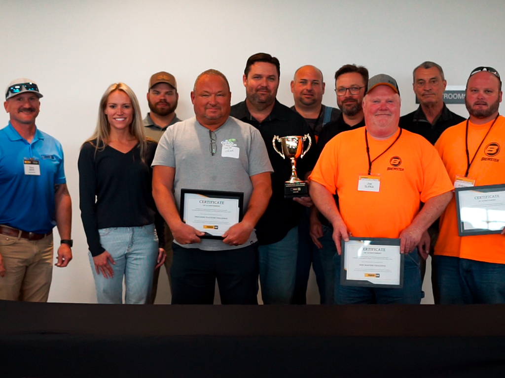 The participants pose with Kelli Fabick after the Fenton qualifier for the Global Operator challenge.